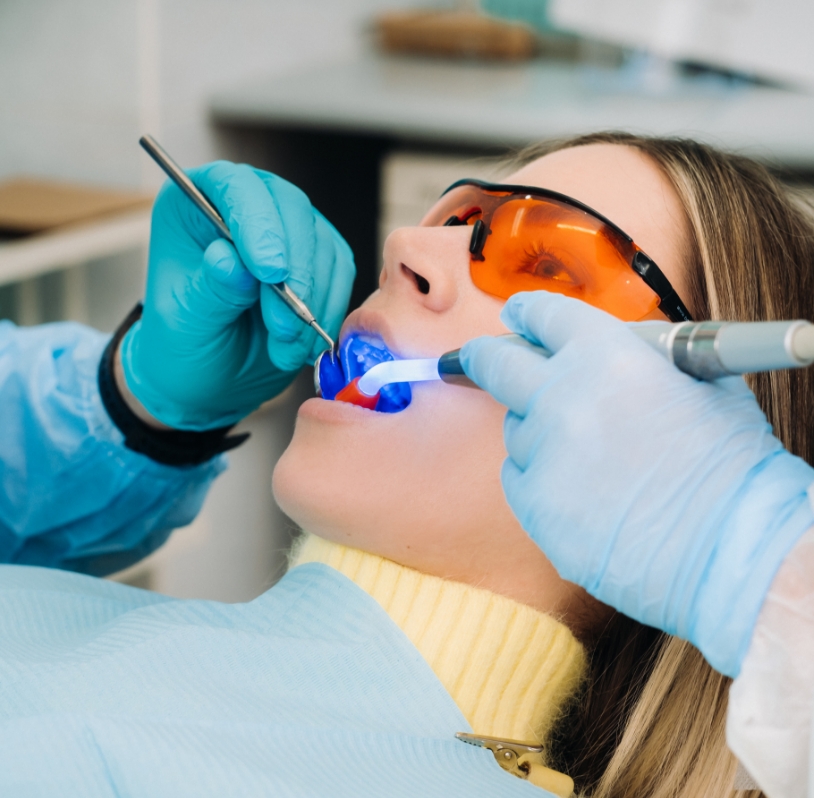 dentist performing dental fillings